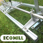 A silver-colored metal chainsaw mill laid on the ground, with the Ecomill logo visible.