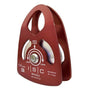 A red colored ISC Medium Prussik Aluminium 13mm Rope Pulley with visible bushings and roller bearings.