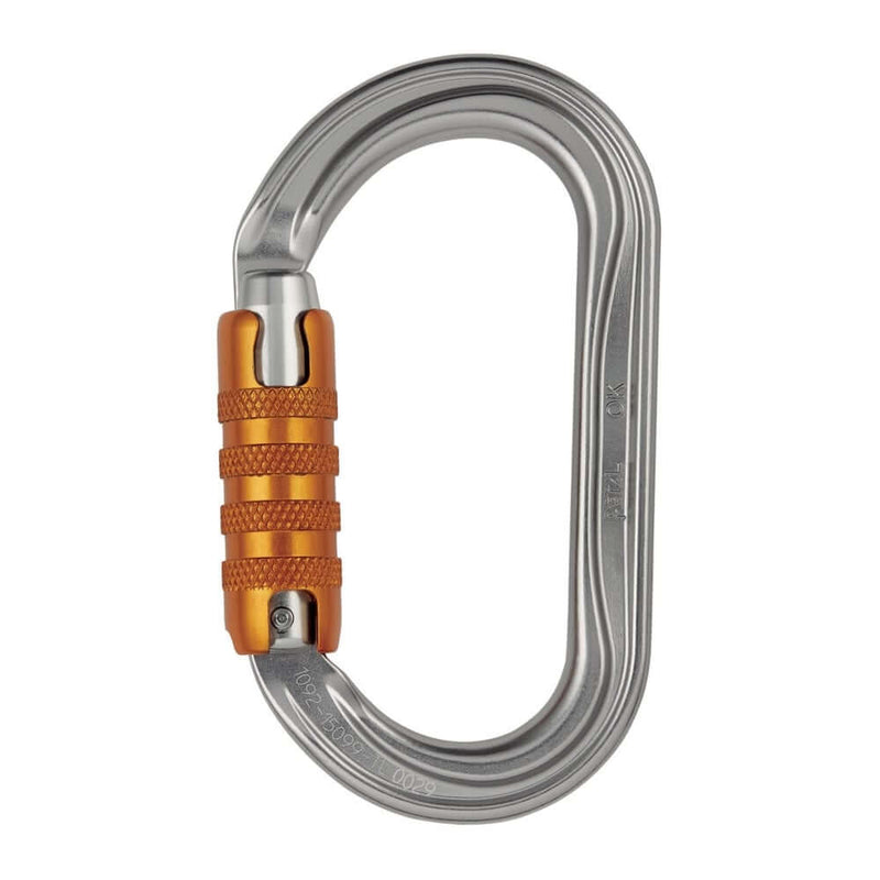 A silver oval-shaped Petzl aluminium carabiner with an orange keylock system.