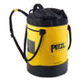 Three Petzl Bucket 45L Rope Bags in yellow, red, and black colors with shoulder straps and exterior pockets.