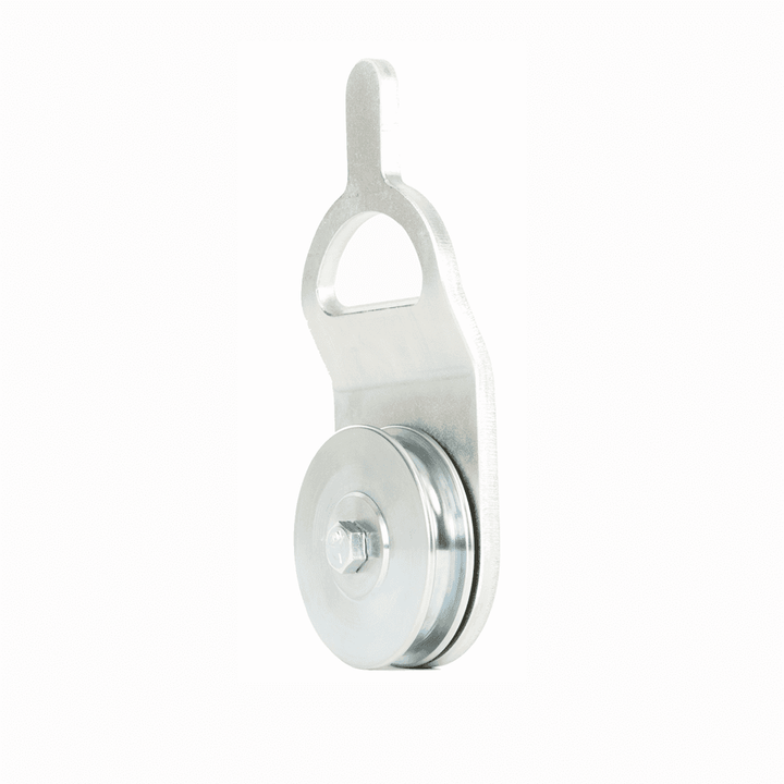 A silver open-faced corner block sheave with a 100mm diameter, designed for pulling trees perpendicularly to the trail.