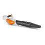 White and orange toy leaf blower. Replica STIHL design for children, battery powered. Child using it outdoors
