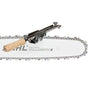 STIHL FF1 Chainsaw File Guide Holder clamped onto a chainsaw guide bar, with a wooden handle and metallic body.
