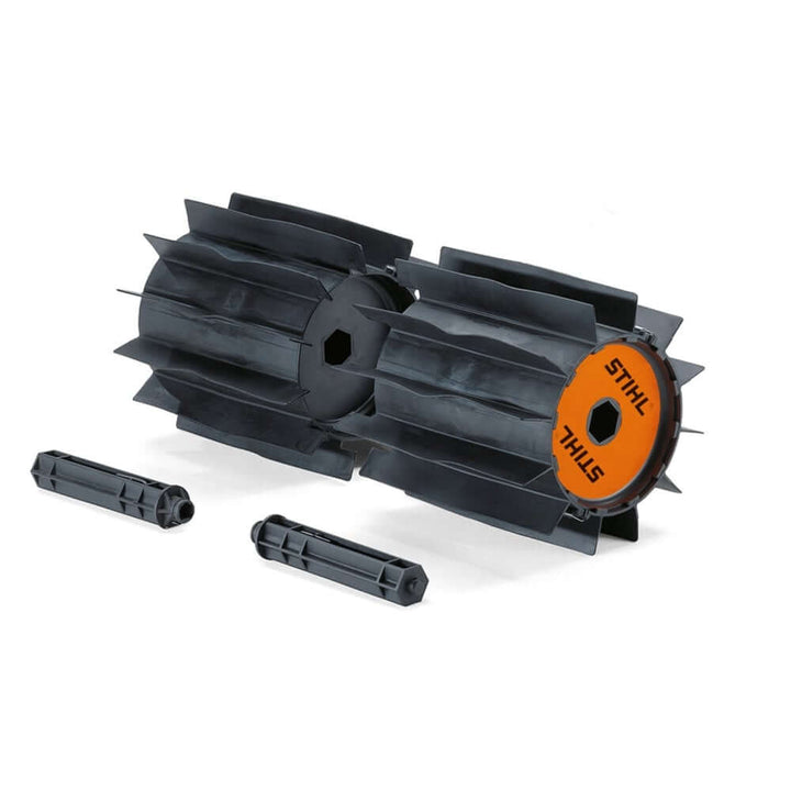 STIHL KW-MM Power Sweep attachment for KombiSystem. Rotating rubber bristles efficiently clear debris, grit, and wet leaves from pathways.