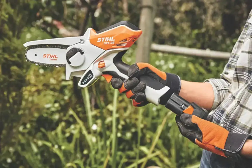 STIHL GTA 26 Is So Good, It’s Almost Cheating at Gardening Work - cordless battery pruning saw in use.