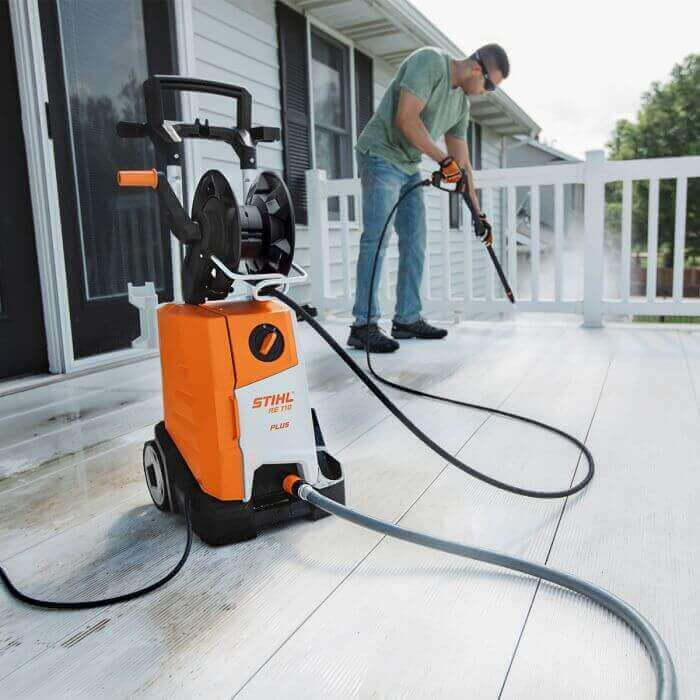 Empower Your Cleaning Routine: The Ultimate Stihl Pressure Washer Review - Stihl pressure washer in action on a deck.