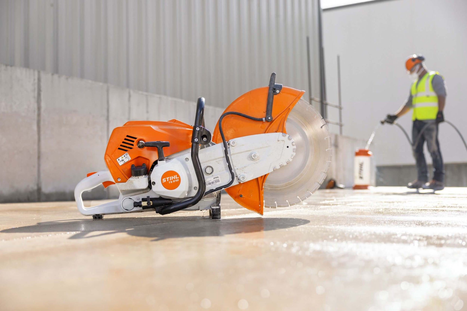 STIHL cut-off machine with precision blade, perfect for tree surgeons and construction tasks.