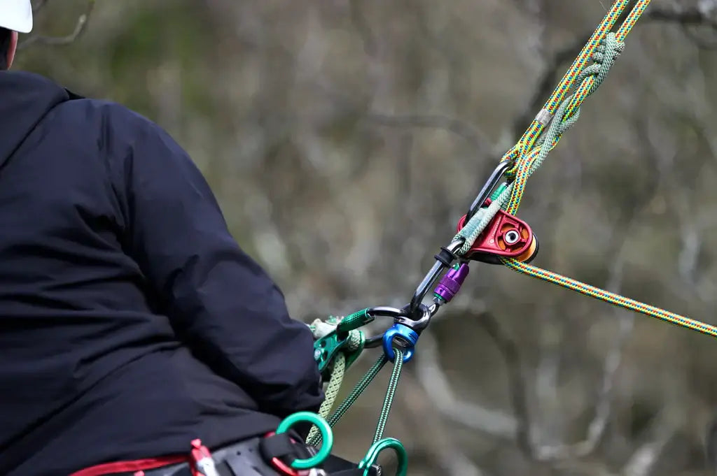 DMM Swivels used by a tree surgeon for efficient rigging and tree climbing.