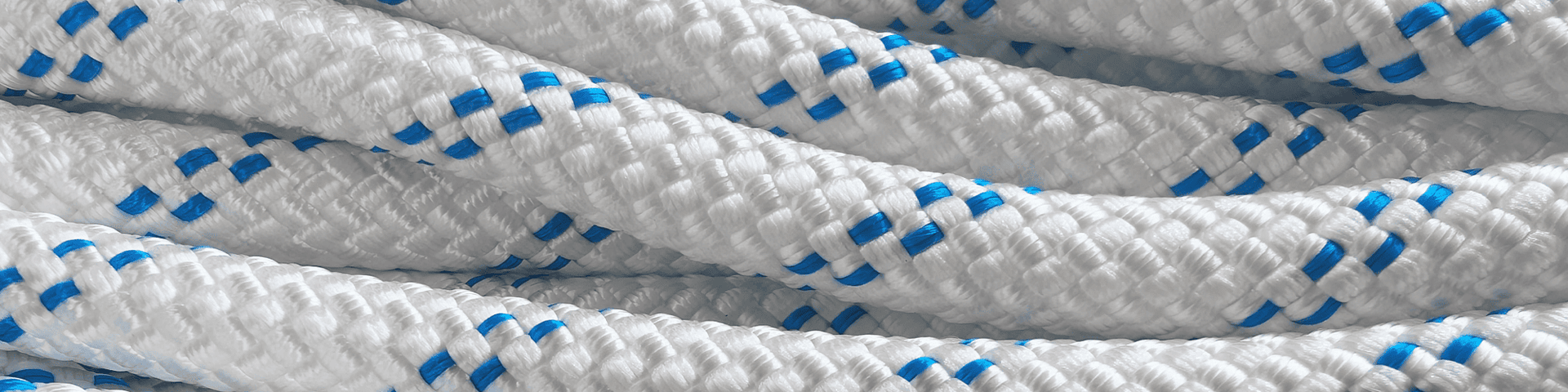 Close-up of English Braids Lowering & Rigging Ropes with white and blue pattern, showcasing strength and durability.