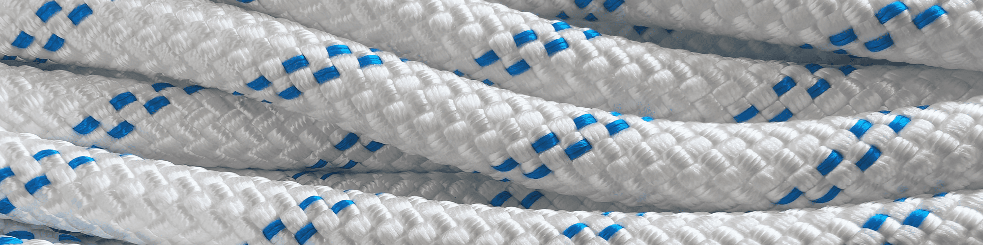 Close-up of English Braids Lowering & Rigging Ropes with white and blue pattern, showcasing strength and durability.