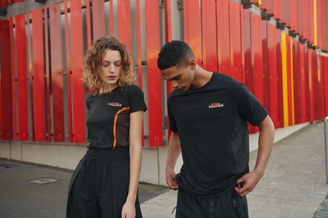 STIHL leisure wear featuring a man and woman in stylish outdoor outfits suitable for tree surgeons.