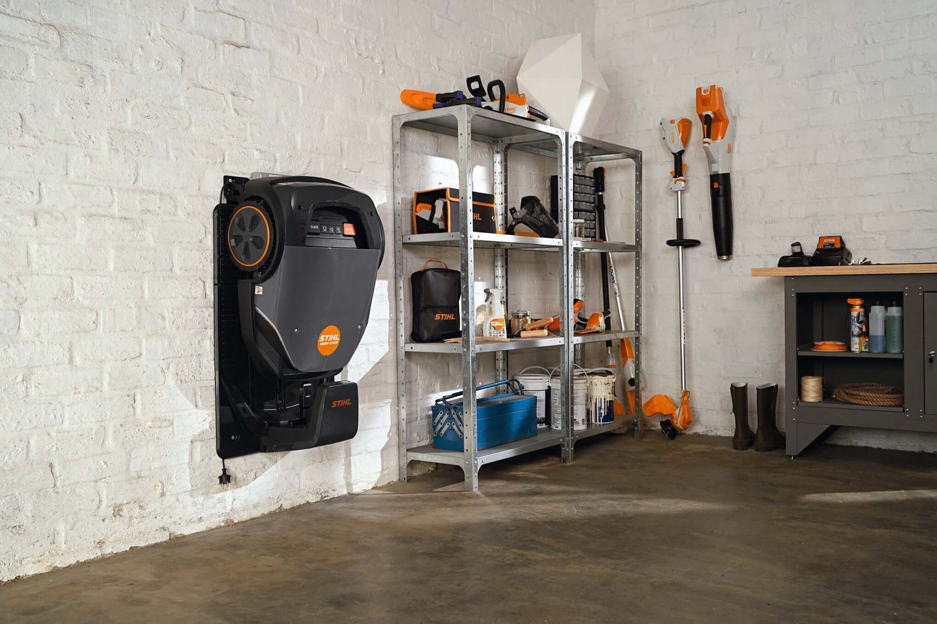 STIHL strimmer accessories organized in a workshop, showcasing tools and equipment for tree surgeons.