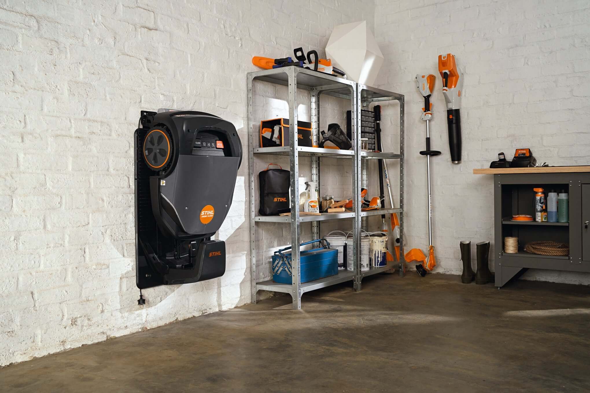 STIHL strimmer accessories organized in a workshop, showcasing tools and equipment for tree surgeons.