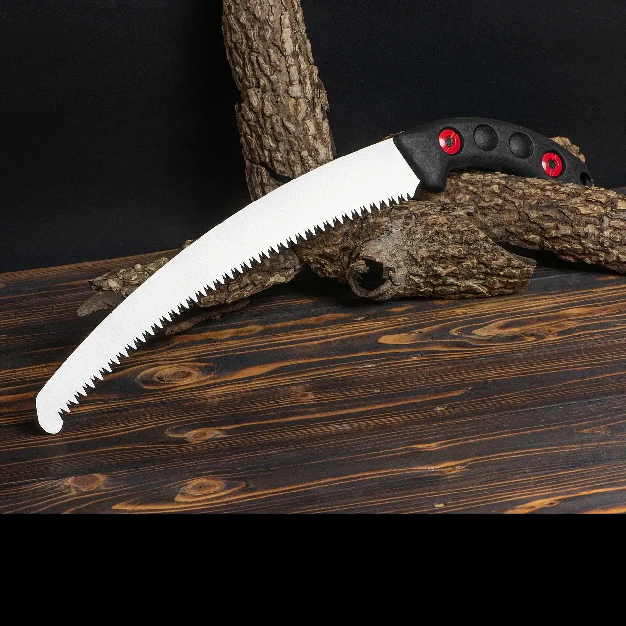 Silky Zubat Hand Saws displayed on wood, showcasing precision curved blade and ergonomic handle for tree surgeons.