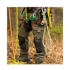 Vented Chainsaw Trousers Type A worn by an arborist, featuring advanced ventilation and lightweight protection in a forest setting.