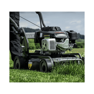 Virtue 46 SMP LV Petrol Mulcher Lawnmower in action on lush grass, showcasing its powerful engine and mulching capabilities.