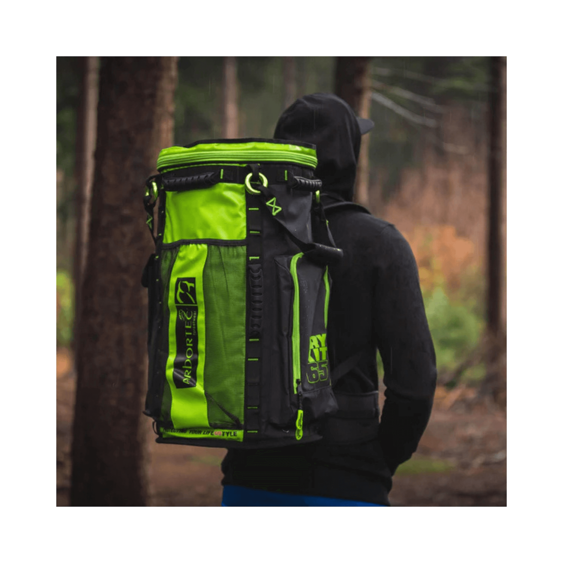 Cobra Drykit Climbing Rope Bag worn by an arborist in a forest setting, showcasing durable, waterproof design.