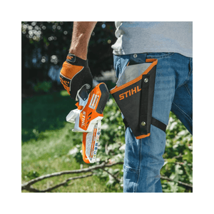 STIHL GTA 26 cordless garden pruner held by a user wearing gloves, showcasing its compact design for tree surgeons.