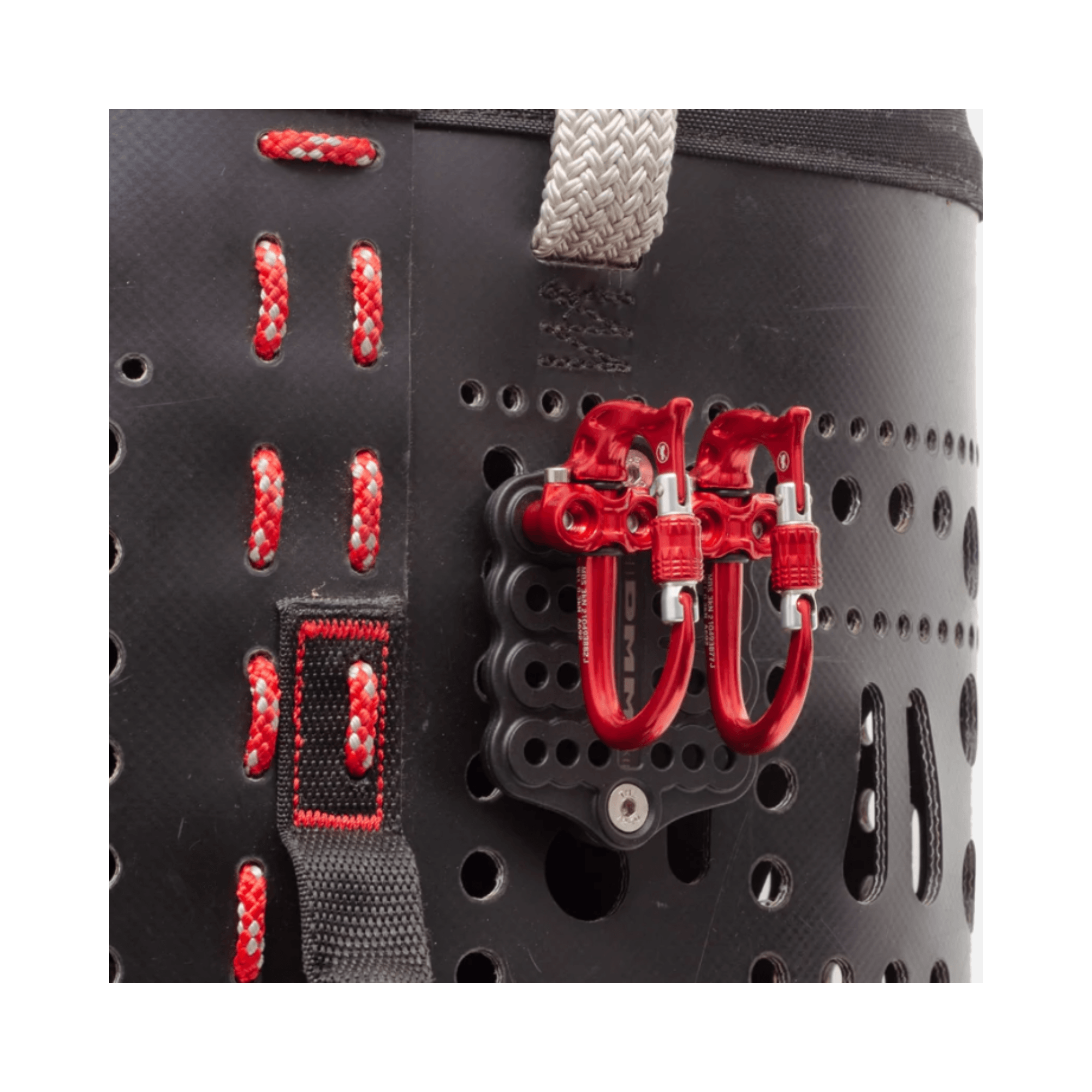 DMM Parking Lot gear mounting adaptor plate with red carabiners attached to harness
