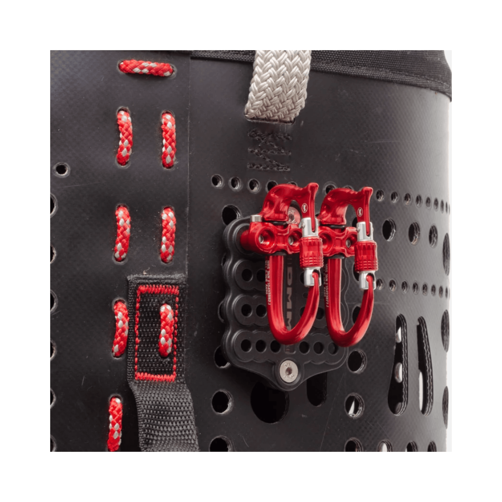 DMM Parking Lot gear mounting adaptor plate with red carabiners attached to harness