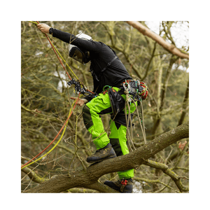 Arbortec Vented Chainsaw Trousers Type A worn by arborist in tree, showcasing lightweight and breathable design.