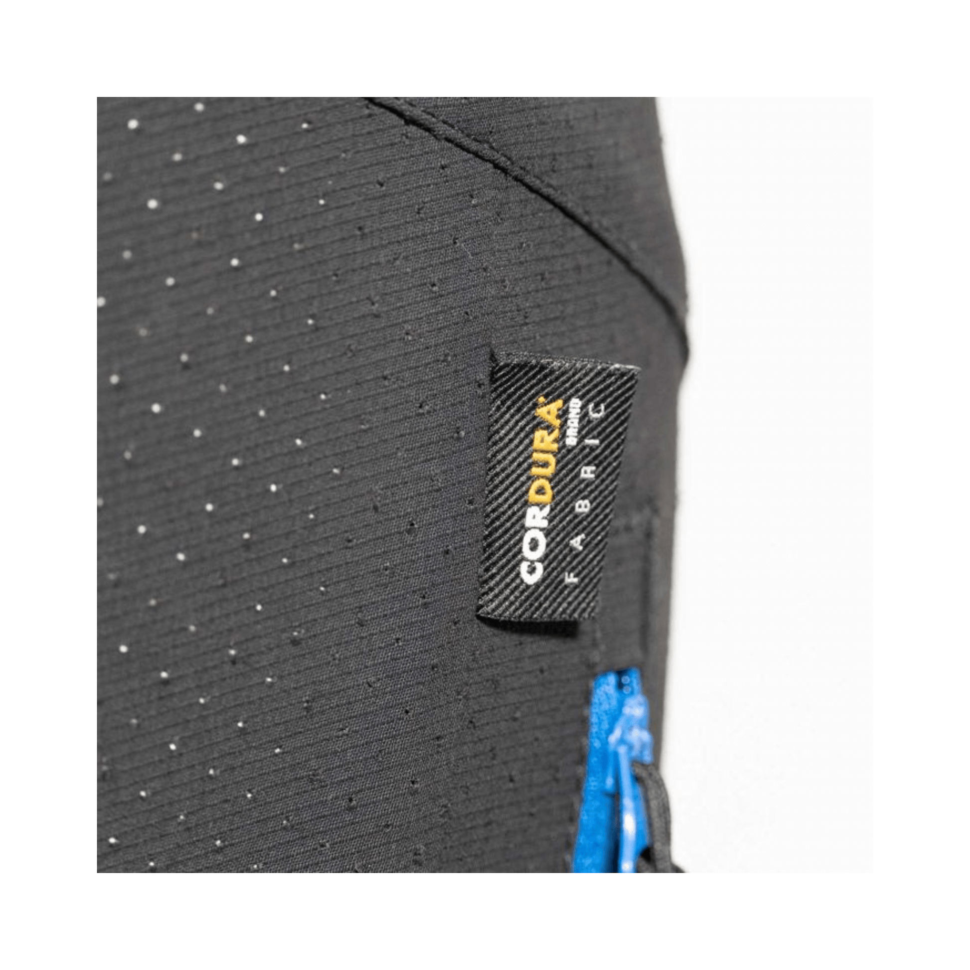 Close-up of Teufelberger Way Up Light Climbing Pants showcasing durable Cordura® fabric tag.