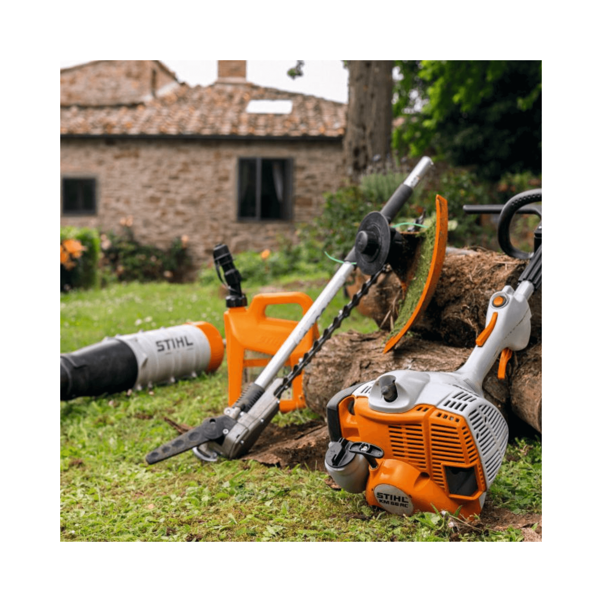 STIHL KM 56 RC-E Petrol KombiEngine and attachments in a garden setting for tree maintenance.