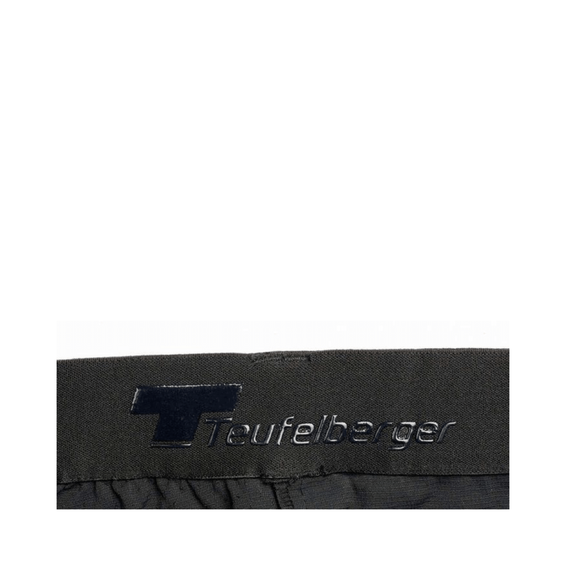 Teufelberger logo on the waistband of Way Up Light Climbing Pants, designed for arborists and outdoor climbers.