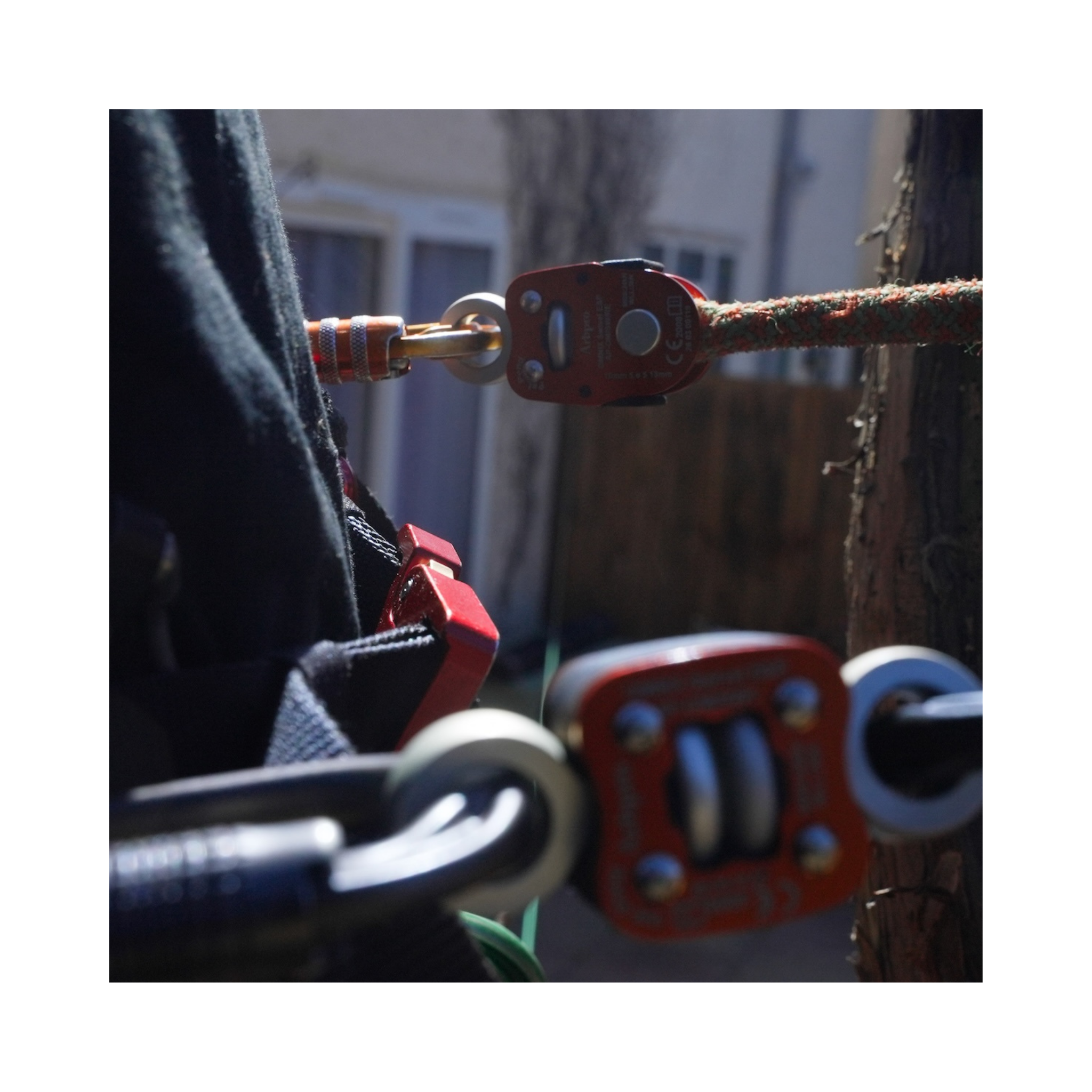 Close-up of climbing gear featuring the Omnix Swivel Eye&Pin connector in action.
