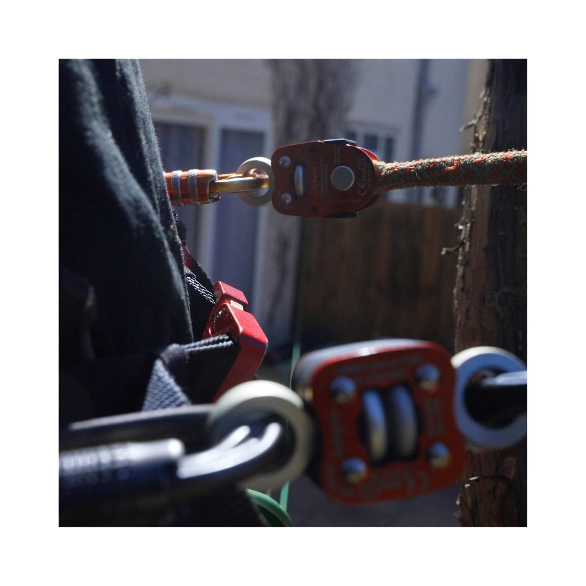 Close-up of climbing gear featuring the Omnix Swivel Eye&Pin connector in action.