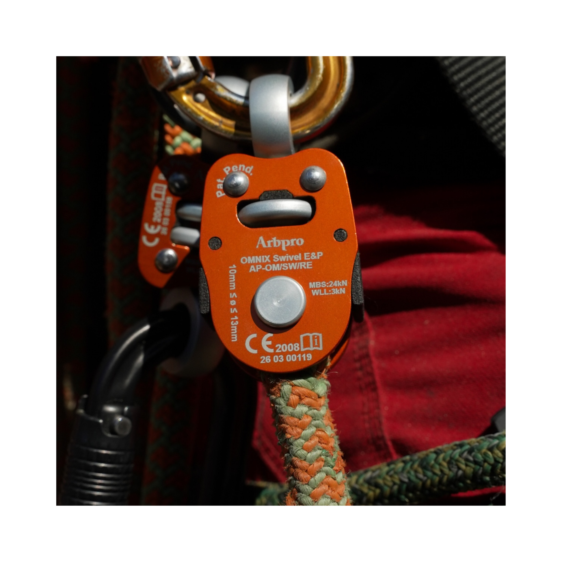 ArbPro Omnix Swivel Eye&Pin connector in use with climbing gear.