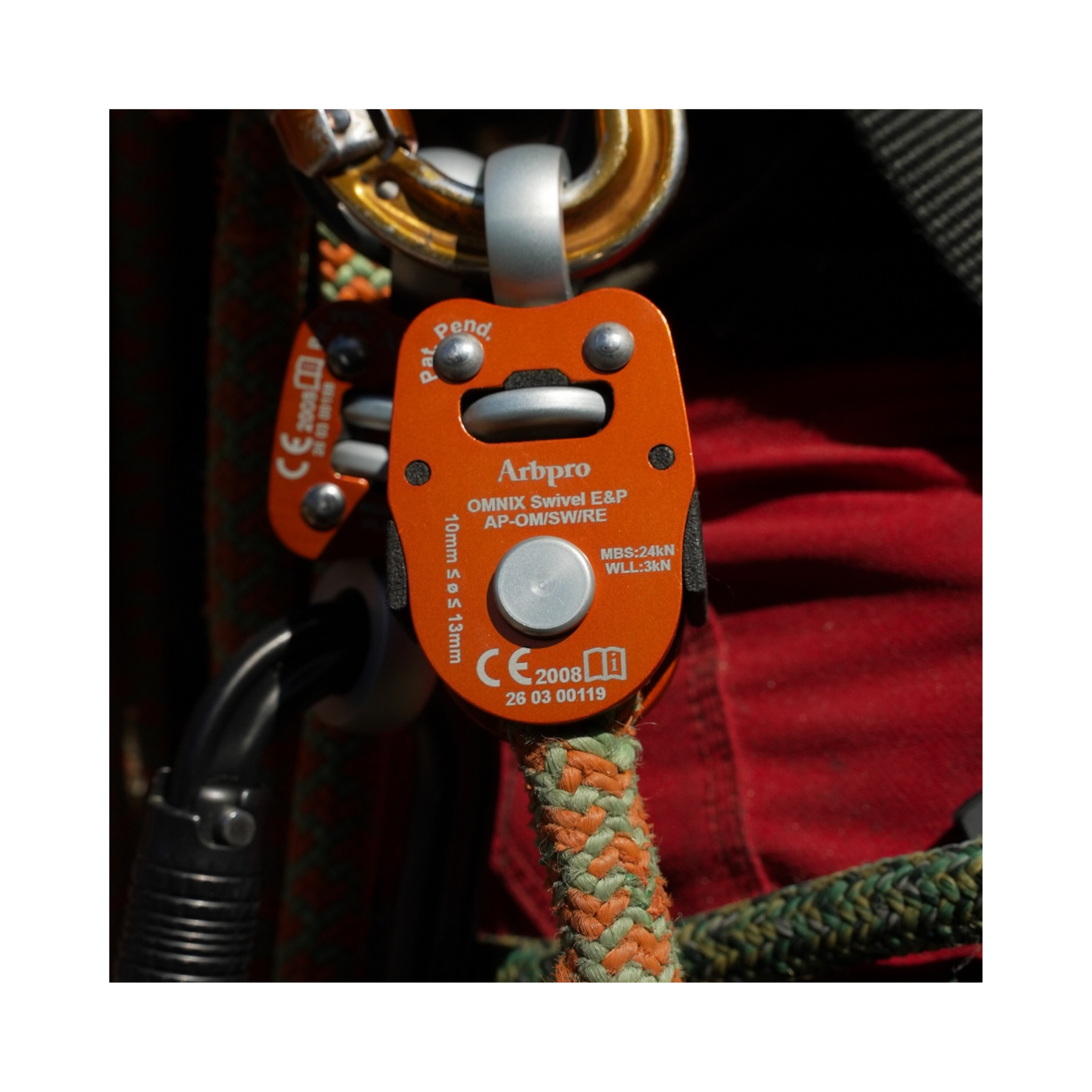 ArbPro Omnix Swivel Eye&Pin connector in use with climbing gear.