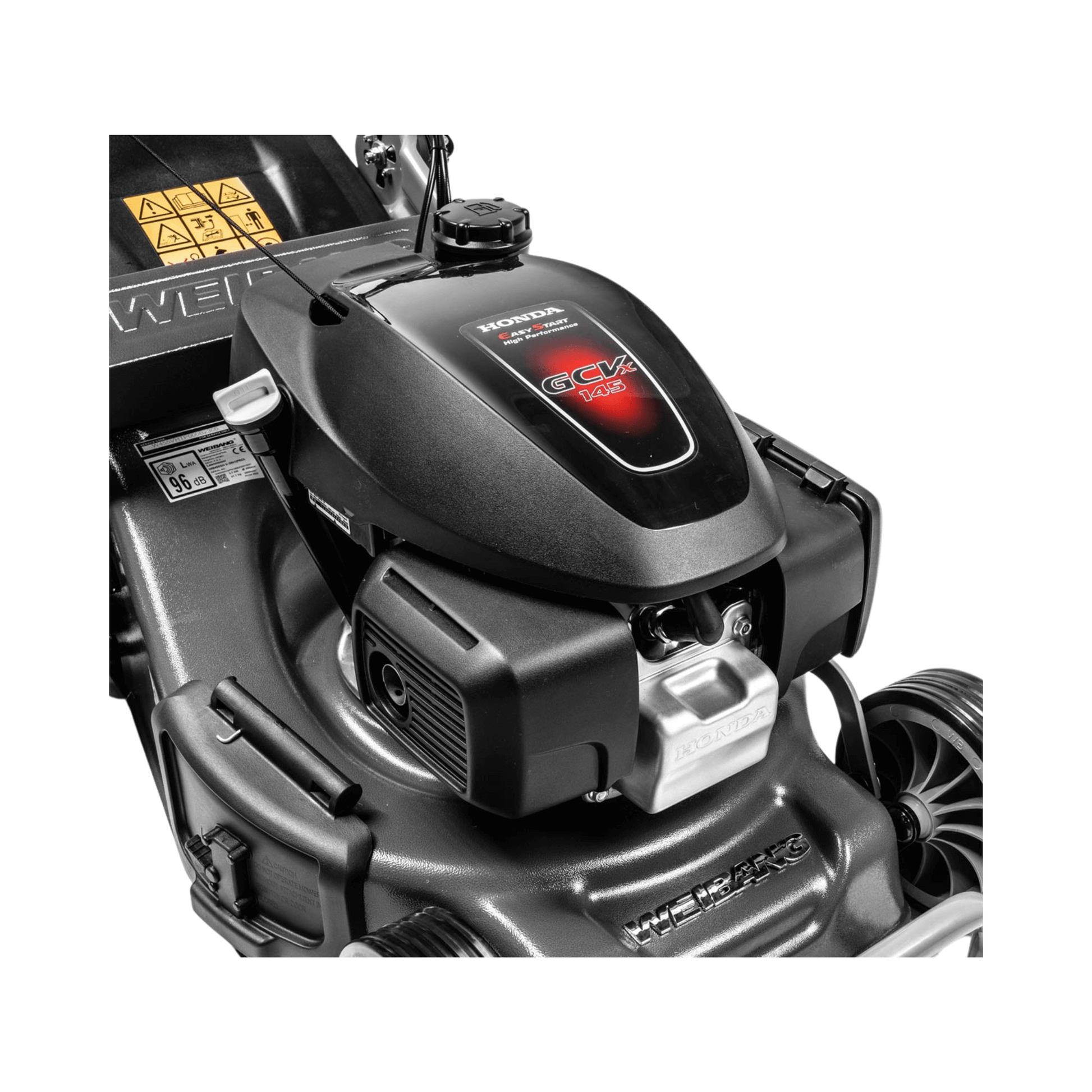 Close-up of the engine of the Virtue 50 SVP-H Variable Speed Petrol Lawnmower for high-performance lawn care.