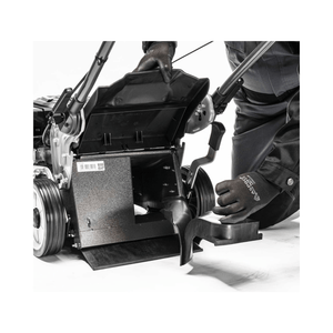 Virtue 46 SPP Push Lawnmower Petrol Lawn Mower showing maintenance with a tree surgeon adjusting components.