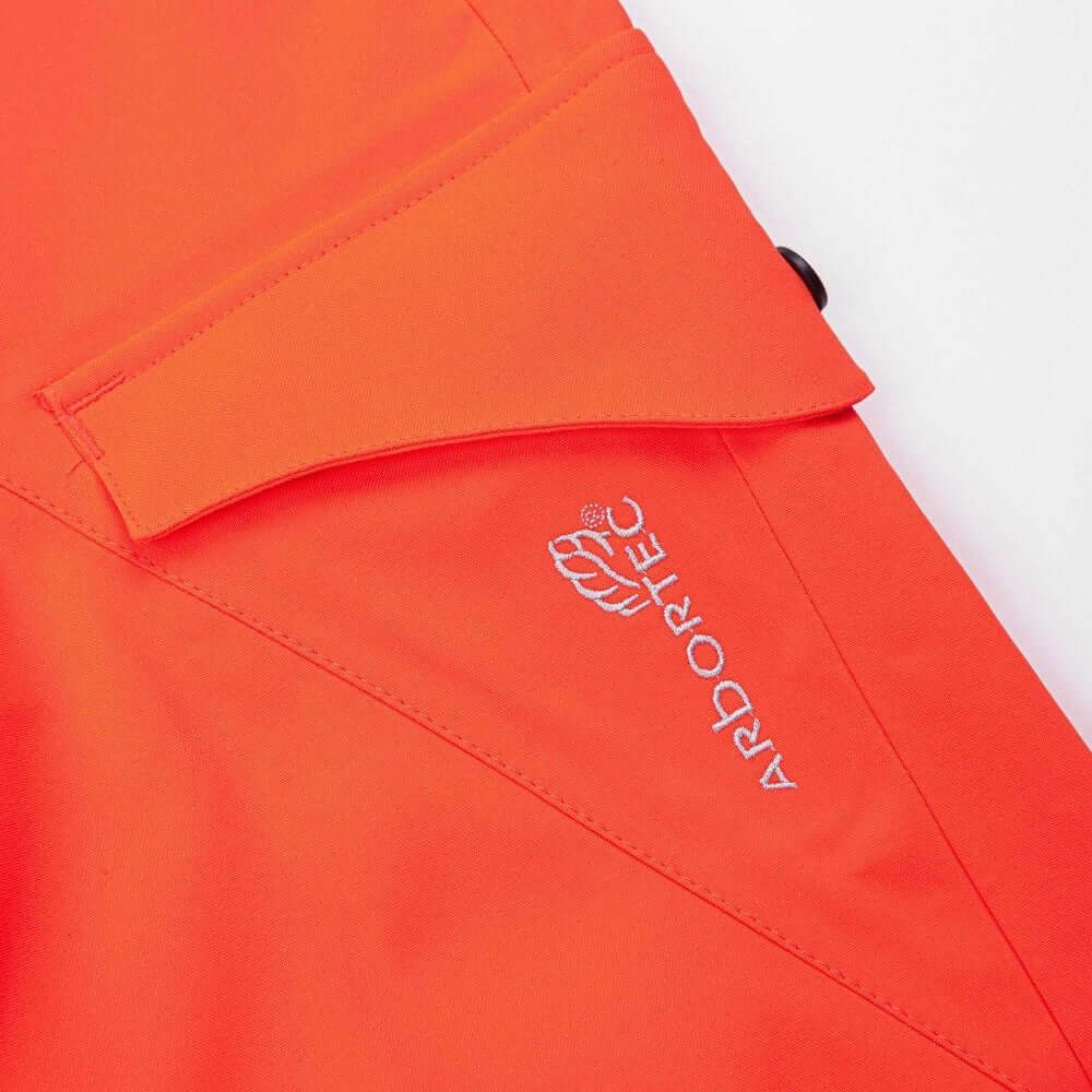 Close-up of Arbortec Arborflex Storm Trousers in Hi-Vis Orange, designed for tree surgeons and outdoor work.