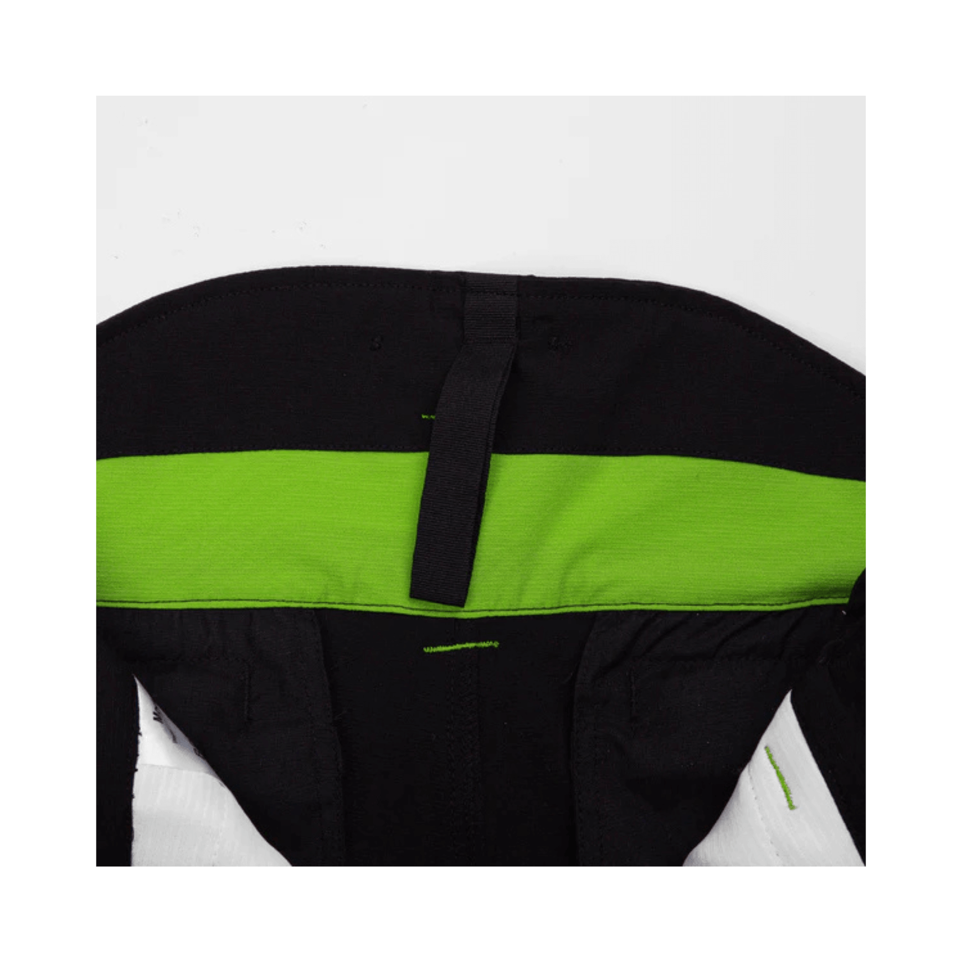 Interior view of Arbortec Breatheflex Chainsaw Trousers with black fabric and lime green waistband.