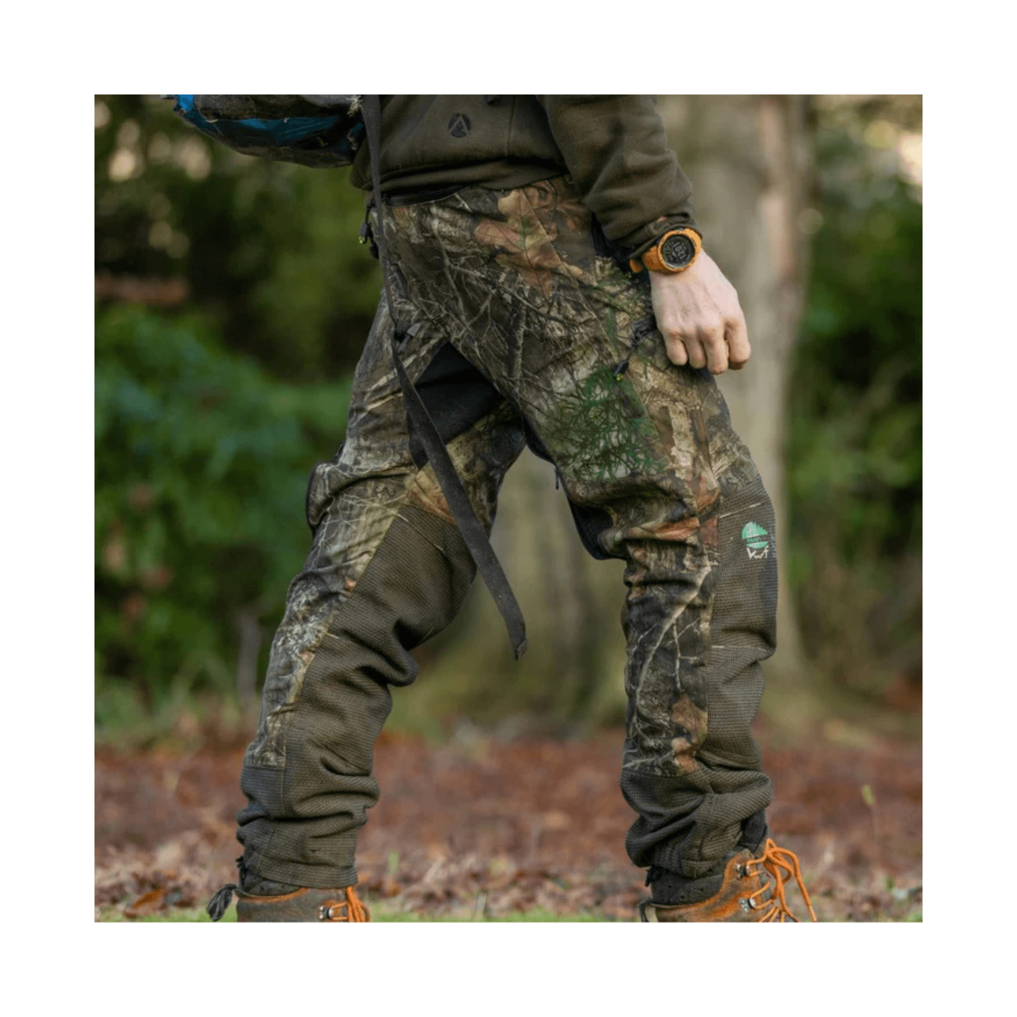 Breatheflex Pro Realtree Chainsaw Trousers Type C worn by a tree surgeon, featuring a camouflage design suitable for outdoor work.