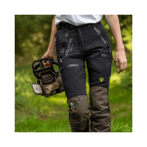 Breatheflex Pro Womens Chainsaw Trousers Type C Black worn by female arborist holding chainsaw in forest.