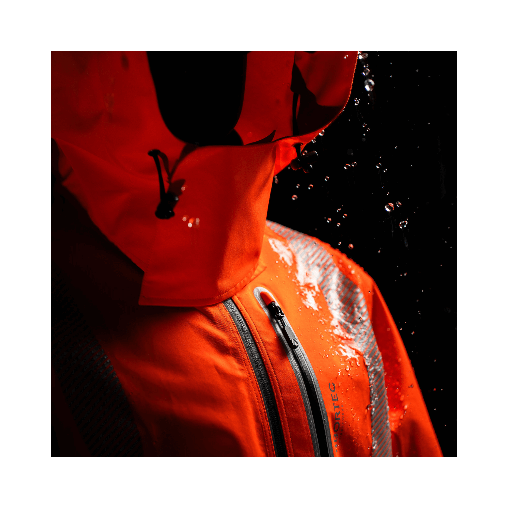 Full Zip Waterproof Work Jacket Hi-Vis Orange with waterproof features and droplets, ideal for outdoor professionals.