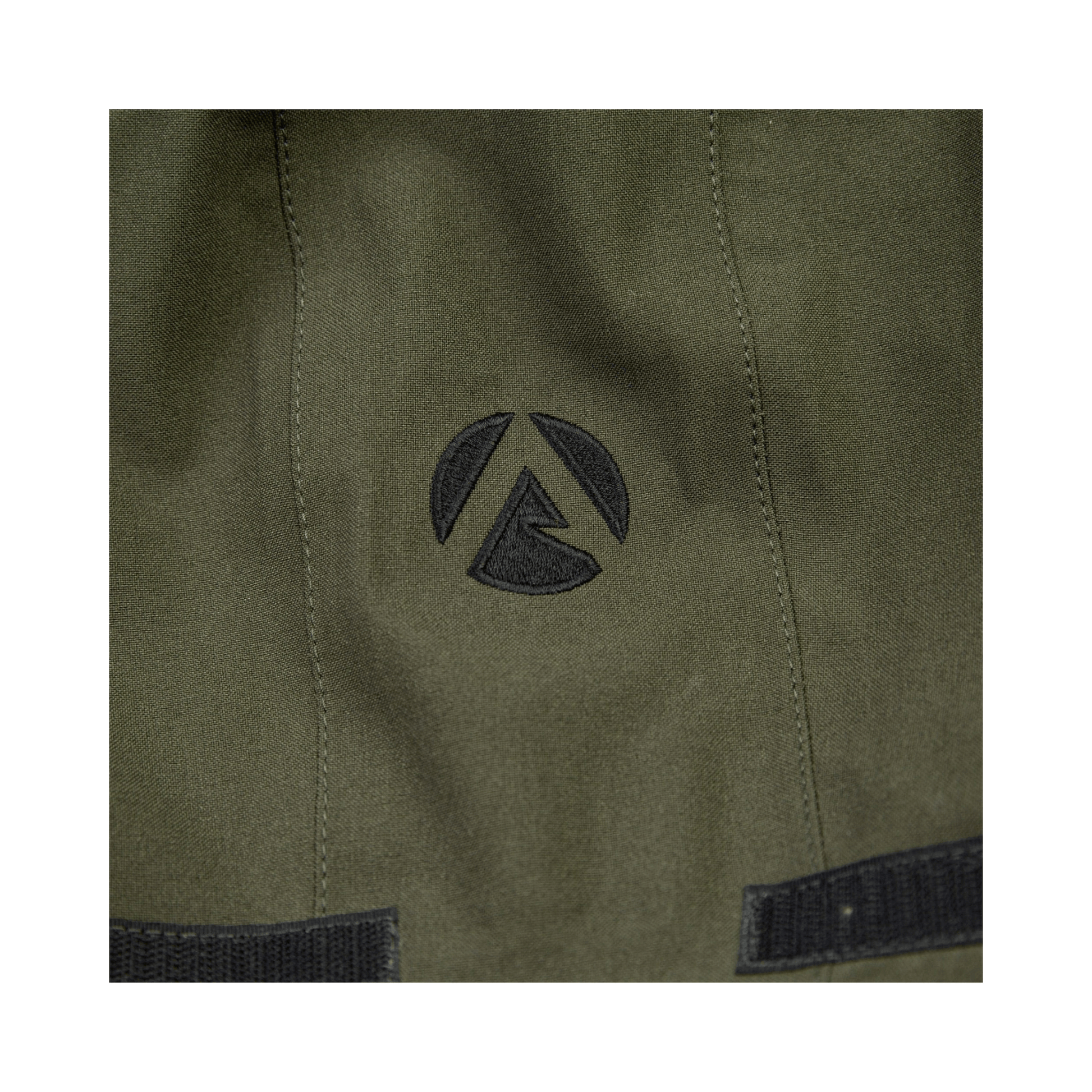 Close-up of logo on Heavy Duty Full Zip Waterproof Jacket Olive by Arbortec, showcasing durability and quality.