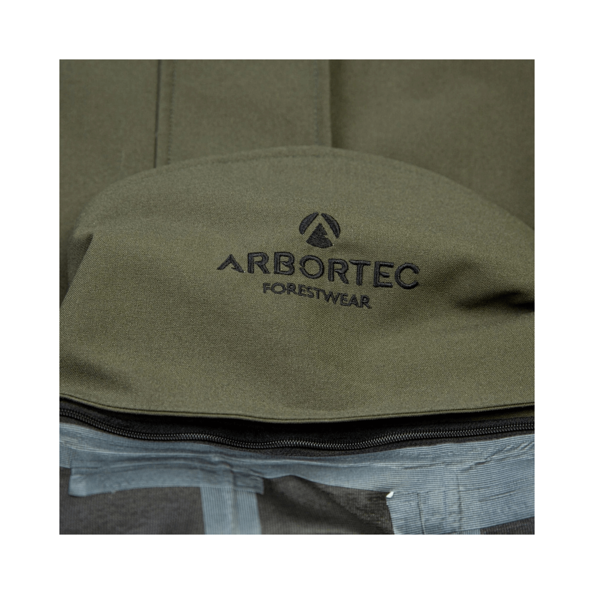 Arbortec logo on a Heavy Duty Full Zip Waterproof Jacket Olive, showcasing quality forestwear craftsmanship.