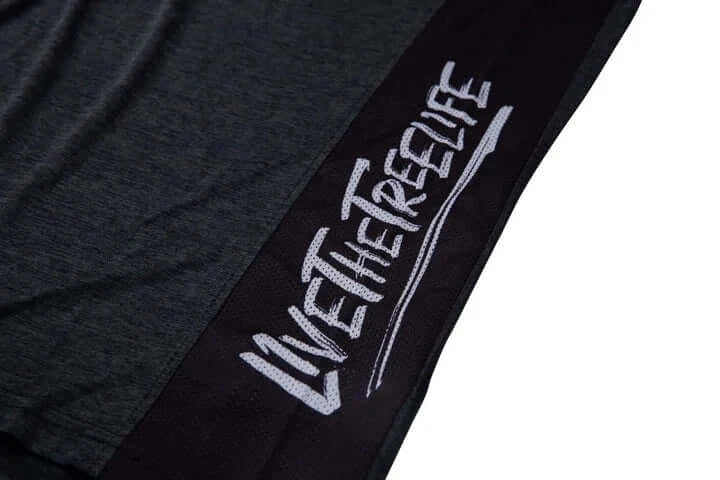 Live the Tree Life graphic on a black Arbortec Performance T-shirt, ideal for tree surgeons and outdoor enthusiasts.