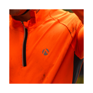 Performance T-Shirt Long Sleeve Orange worn during outdoor activities, showcasing high-visibility design and comfort features.