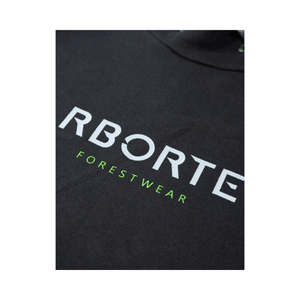Close-up of black Arbortec pullover hoodie featuring the 'RborTE Forestwear' logo in white and green.