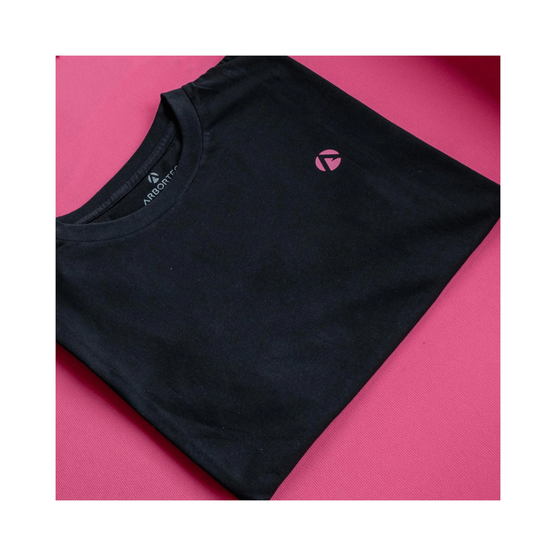 Short Sleeve T-Shirt Black displayed on a pink background, featuring a small pink Arbortec logo.
