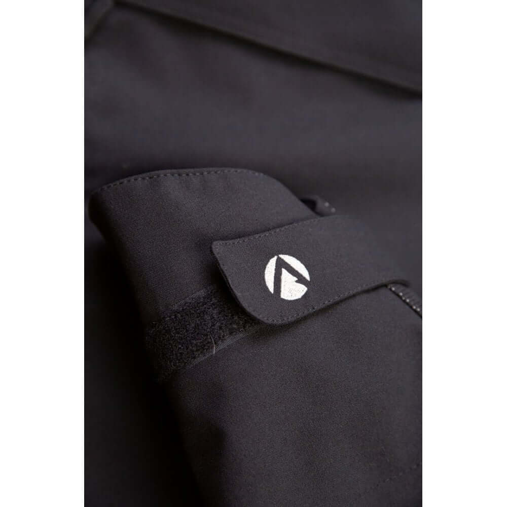 Close-up of the Arbortec Heavy Duty BreatheDry black jacket sleeve, showcasing premium waterproof fabric and logo.
