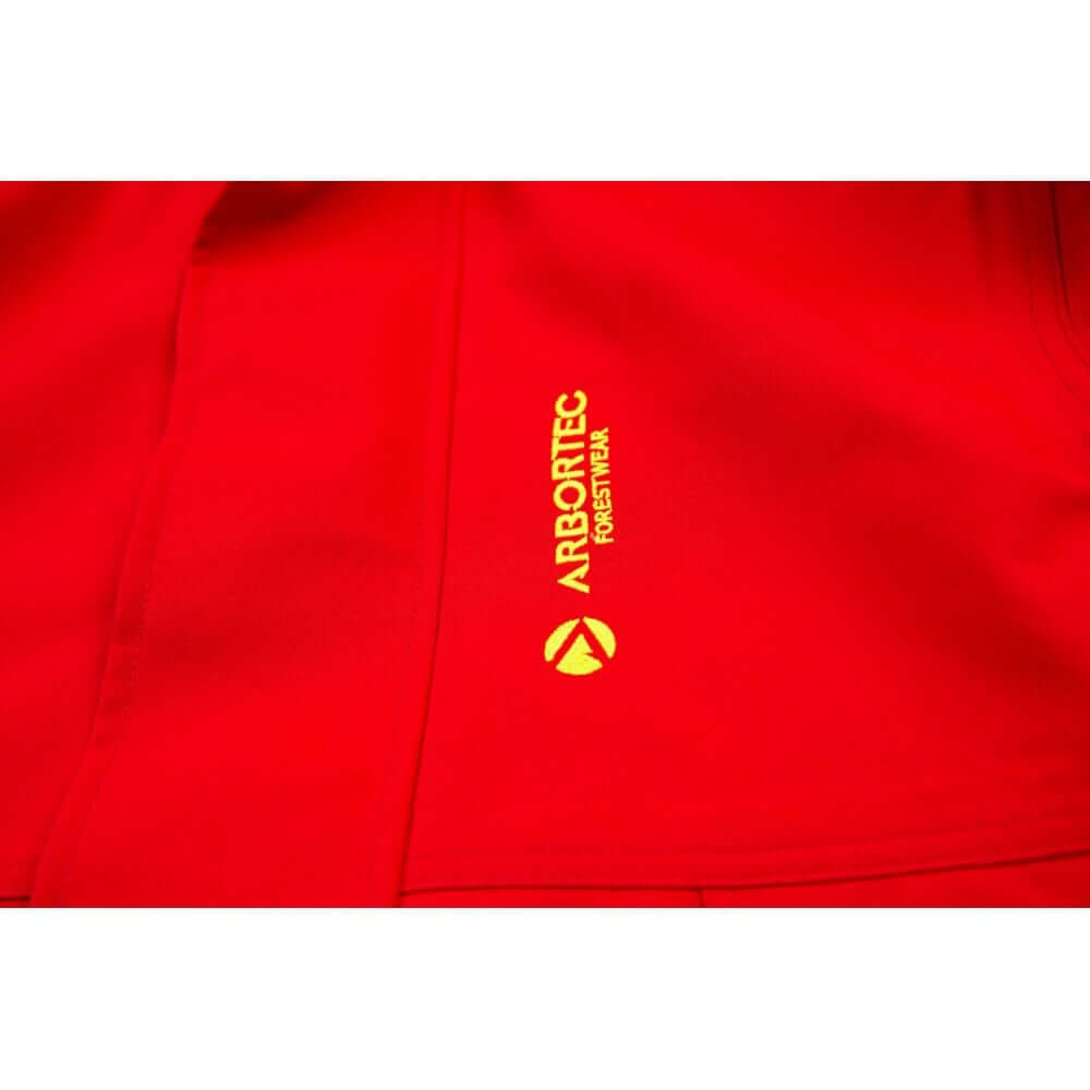 Close-up of the Arbortec Heavy Duty BreatheDry red jacket showcasing the logo, ideal for tree surgeons.