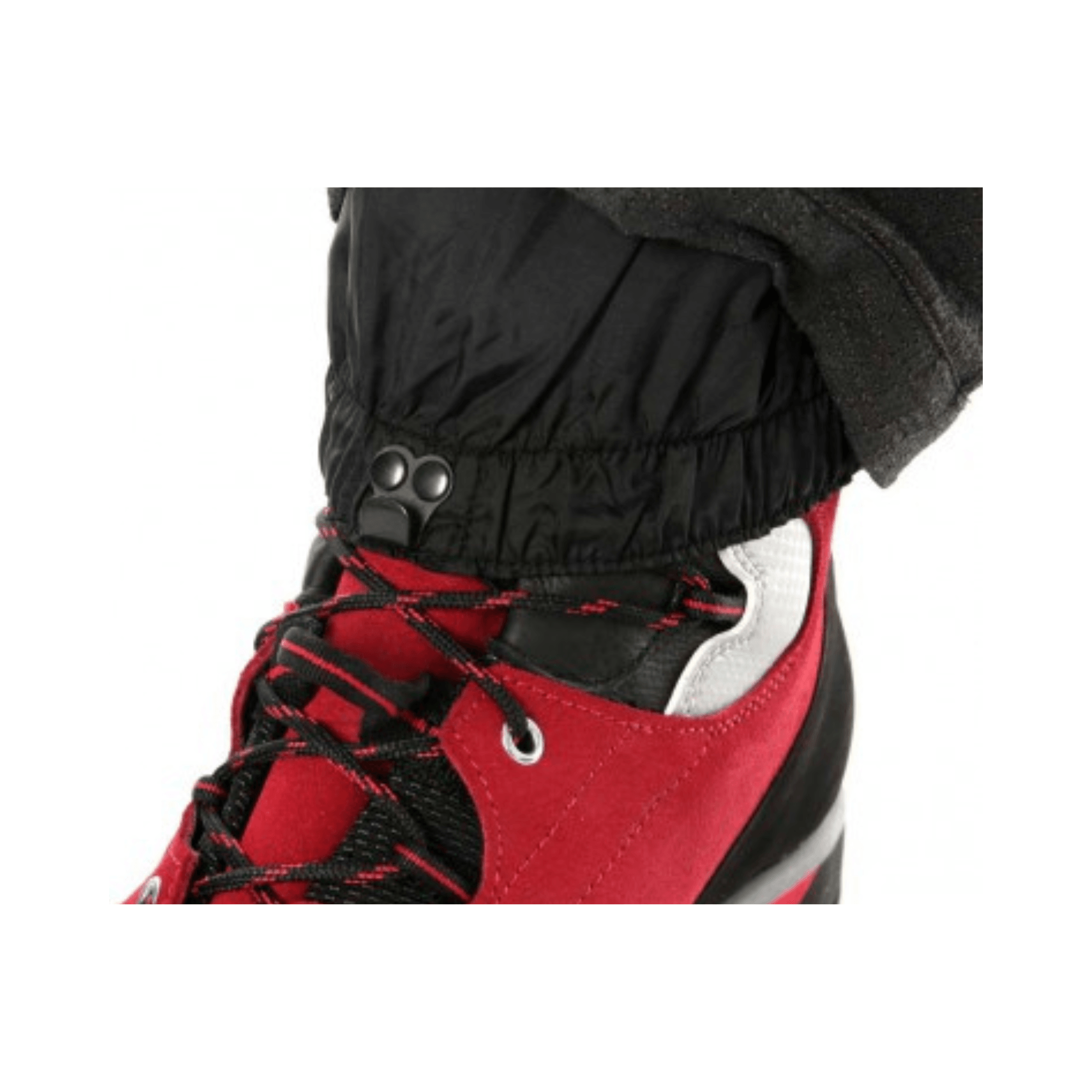 Climbtech Gamma Chainsaw Trousers Black Type A close-up detail of ankle cuff with red footwear.
