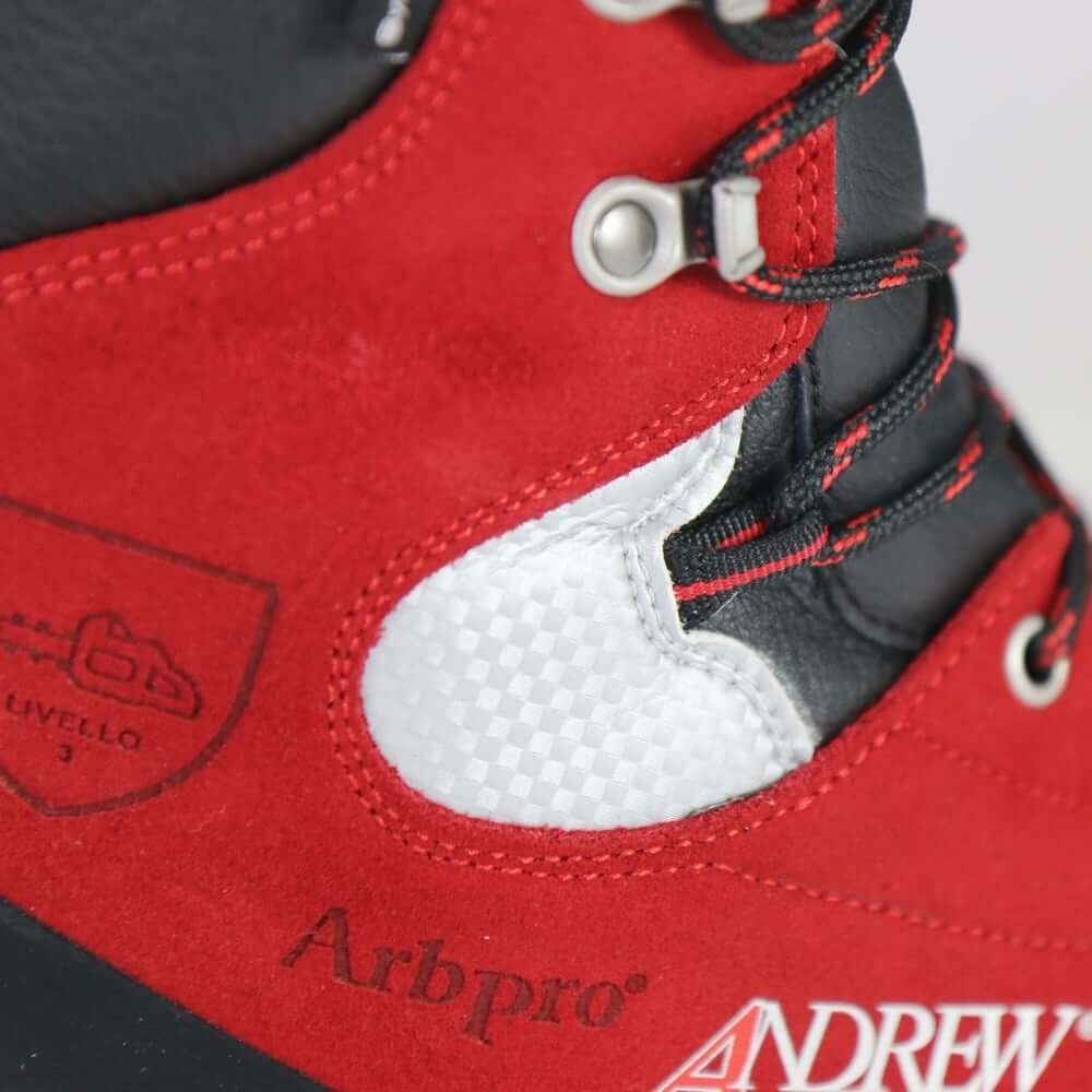 Close-up of Arbpro Cervino Wood Class 3 chainsaw safety boots for tree surgeons in red and black.