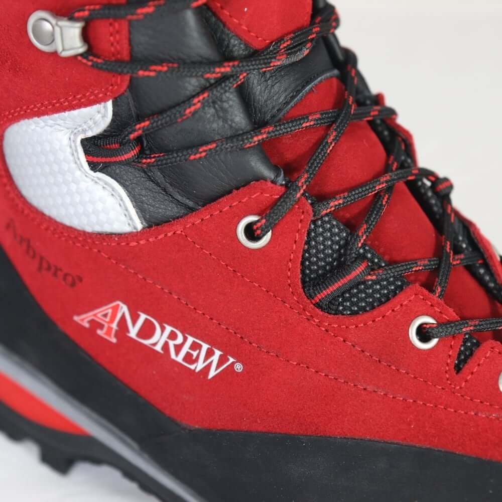 Close-up of Arbpro Cervino Wood red chainsaw boots designed for tree surgeons with a lightweight and rope-friendly lacing system.
